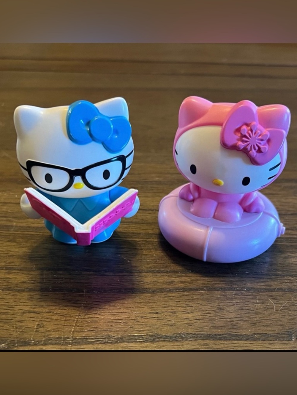 Hello Kitty figures. Bookworm 2013 & Loves Reading 2011